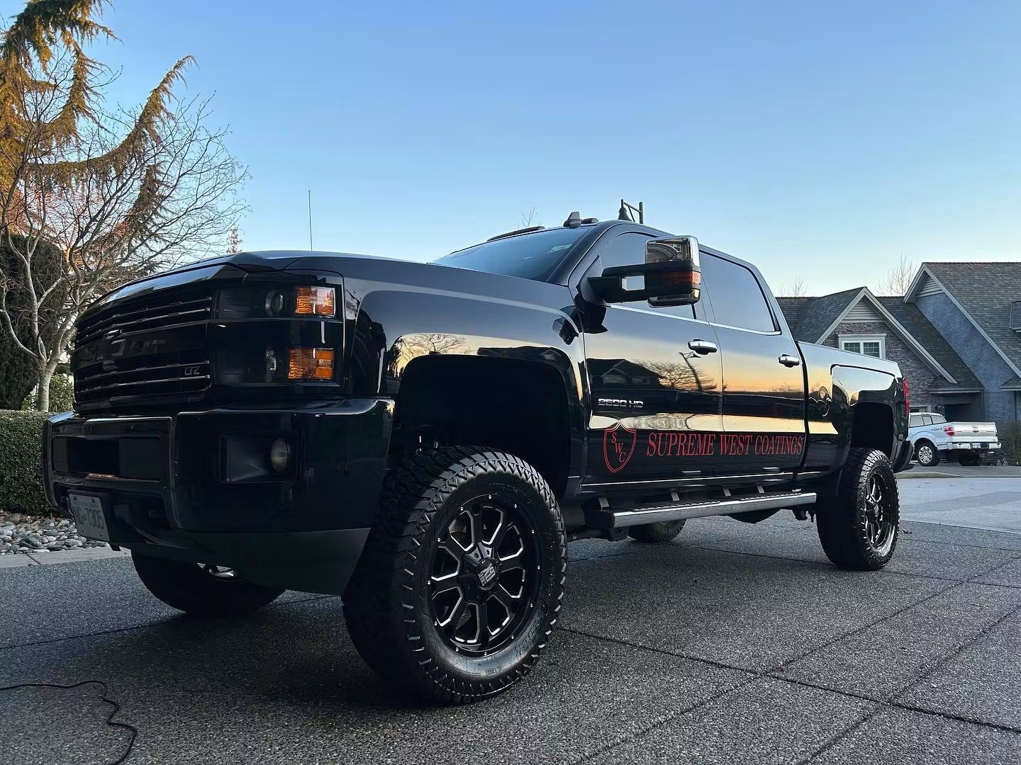 Black Supreme West Coatings pickup truck with a mirror-shine finish